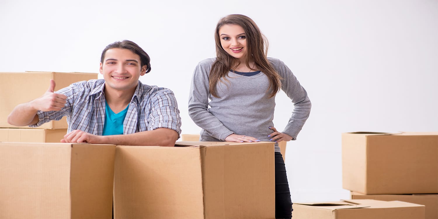 Happy home sellers ready to move - cash home sale advantages concept